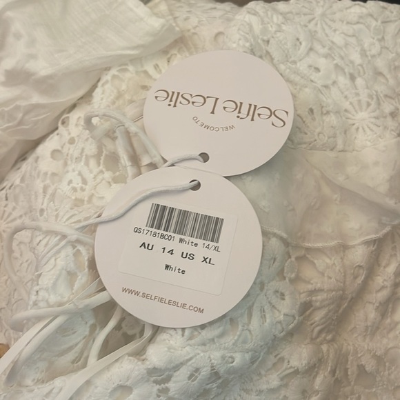 Size XL white dress. Never worn still has tags! - Picture 2 of 2